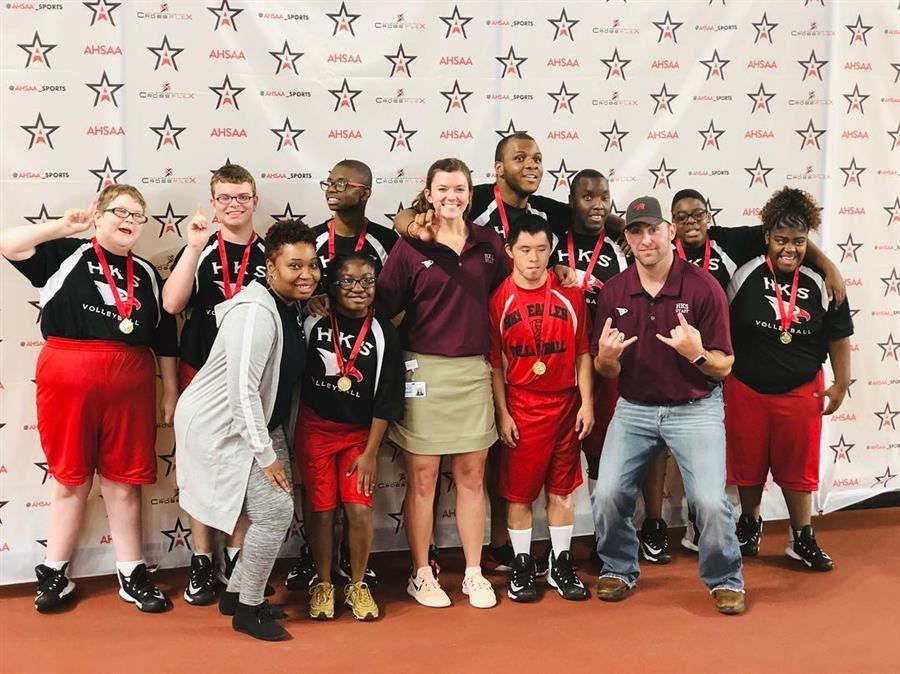  Team members and coaches together after the win